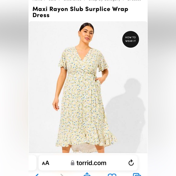 torrid Dresses & Skirts - Torrid, brand new with tags. Rayon Maxi wrap dress. Size 0(12)
